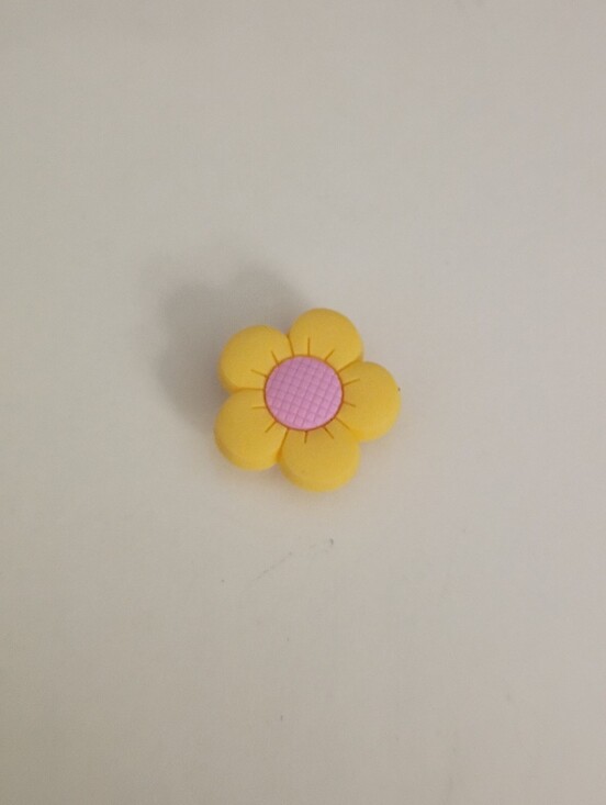 CROCS Other - 10 for $10 Jibbitz Croc Charm - Small Daisy Yellow Petals with Pink Pistol